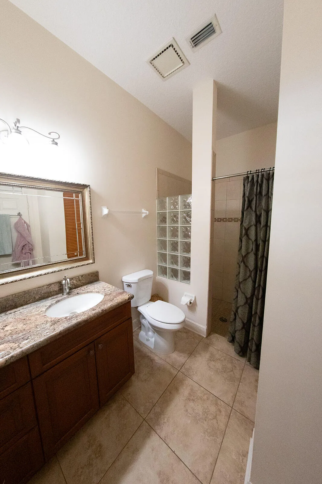 Separate commode and shower in master