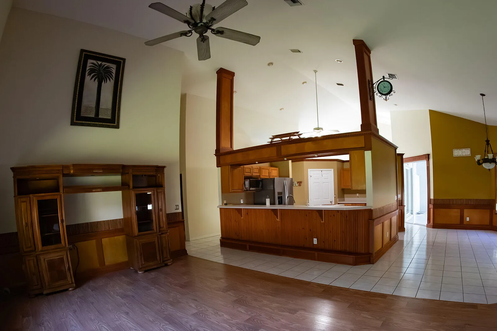 Family faces dining and kitchen