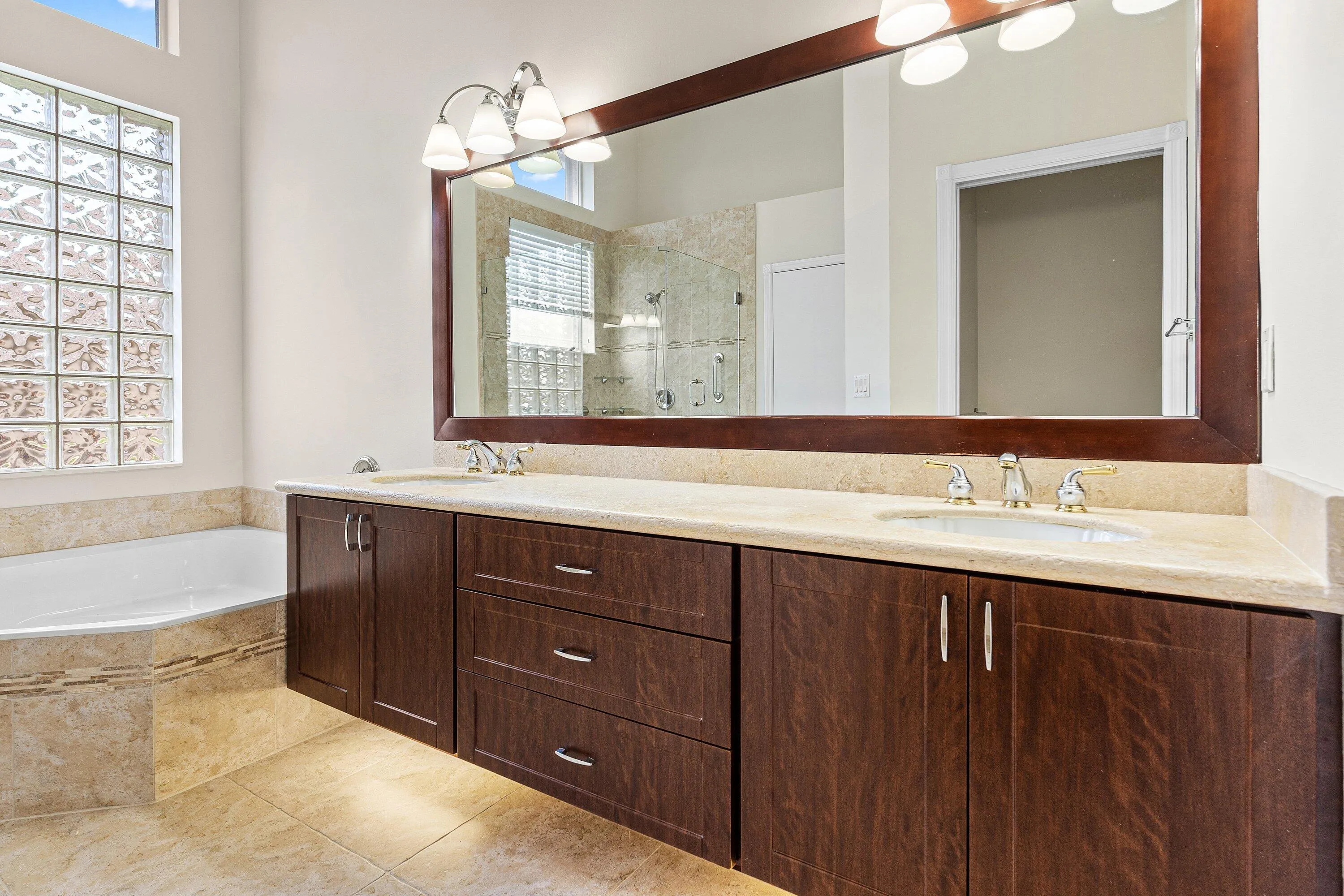 Dual Sinks and limestone counter tops