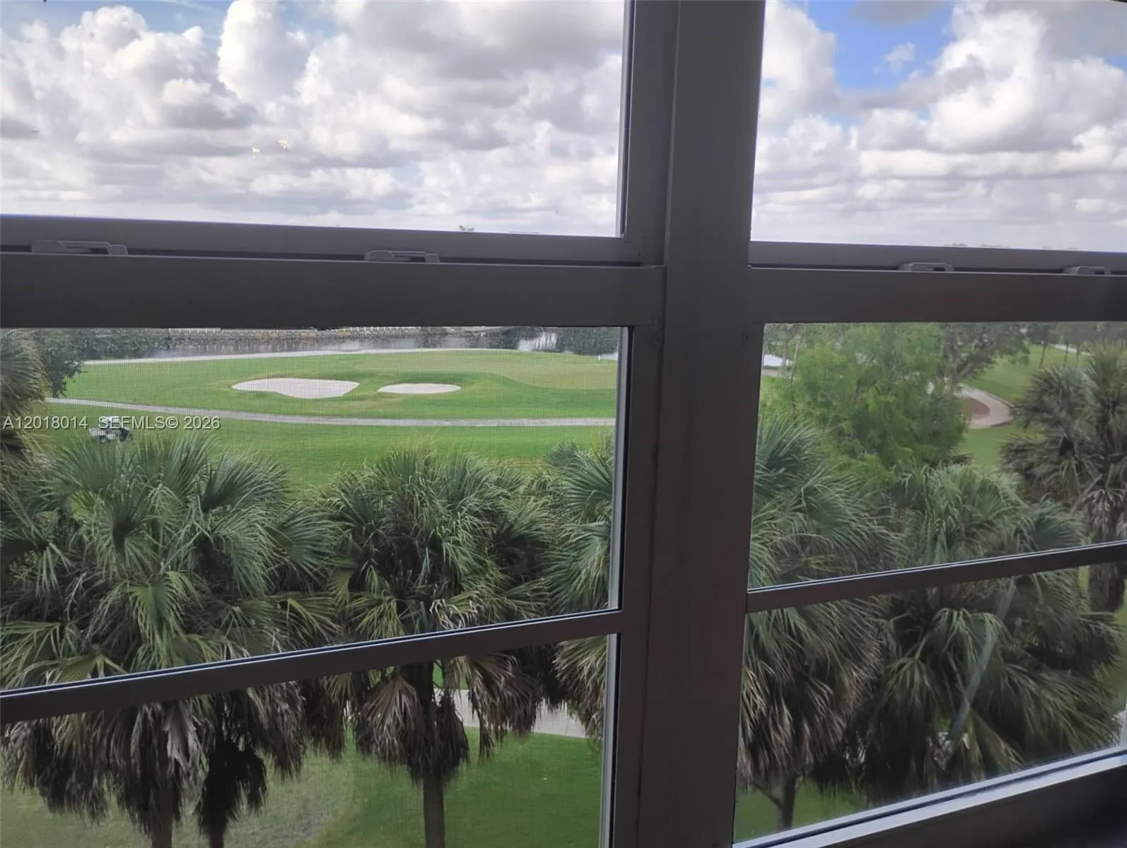 View from Master Bedroom to Garden and Golf Course