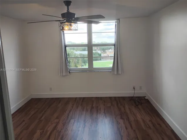 Master Bedroom with a calming view to the Garden and Golf Course