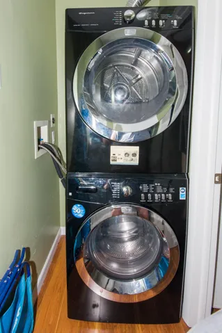 Large laundry closet with washer / dryer and utility sink