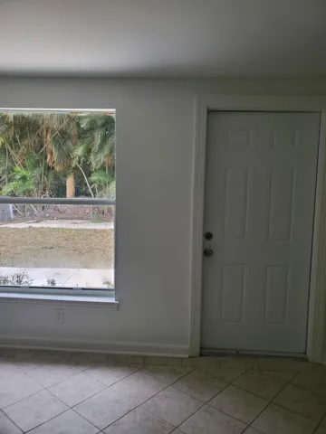 Back bedroom door to outside fenced back