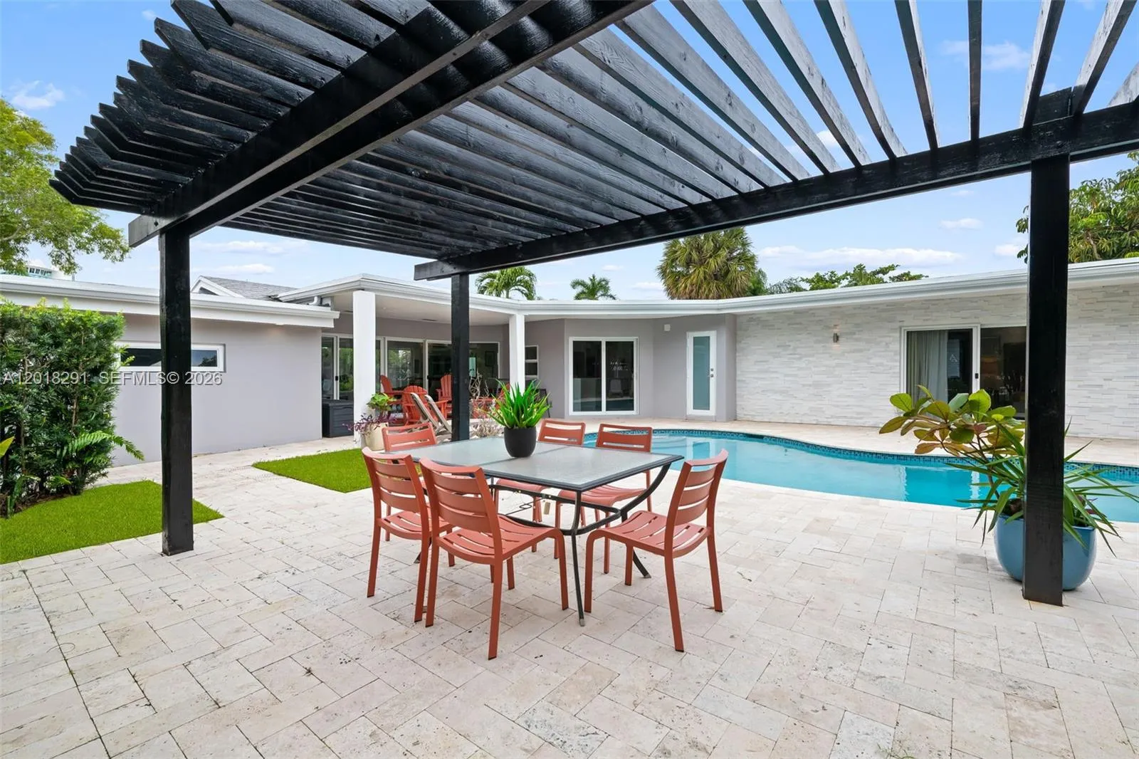 Outdoor oasis featuring pergola