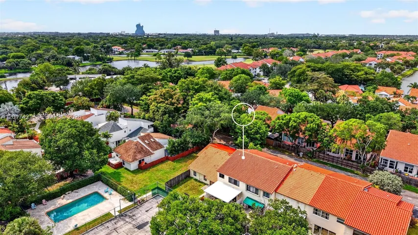 Check out the proximity to the Hard Rock Guitar Hotel. See community pool behind the property (and currently not in use tennis court). Tree lined community