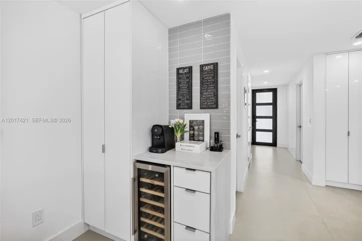 Bar area w/ wine cooler / coffee station w/ extra storage
