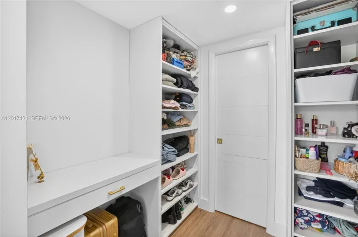 Guest closet even has a desk or makeup vanity area!