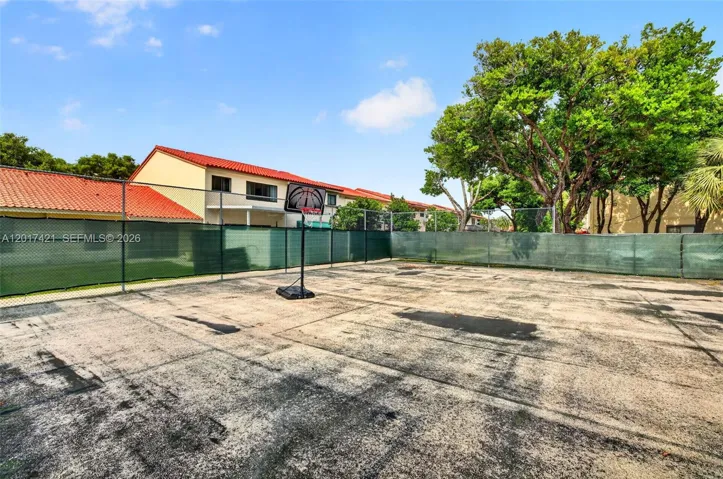 Behind the property is this community tennis court, which is currently not being used