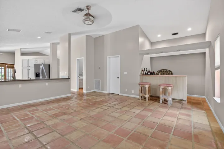 Massive living area complete with a wet bar.