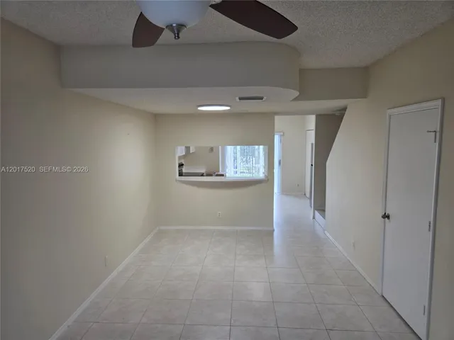 FAMILY/LIVING ROOM FACING KITCHEN