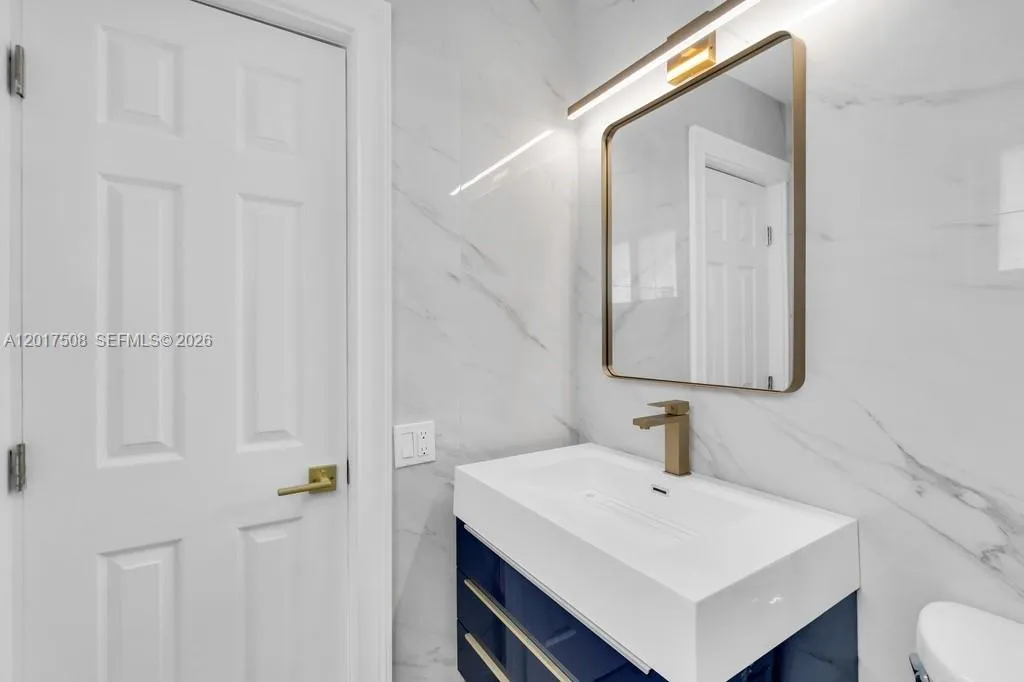 Modern Renovated w/ Gold Accents