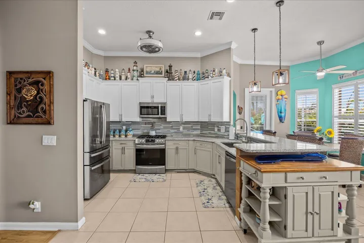 With island stored under countertop...