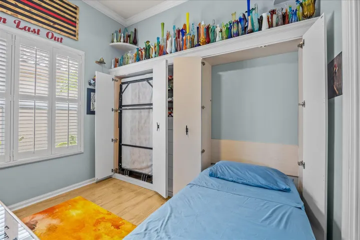 Built in wall unit with 2 twin murphy beds...