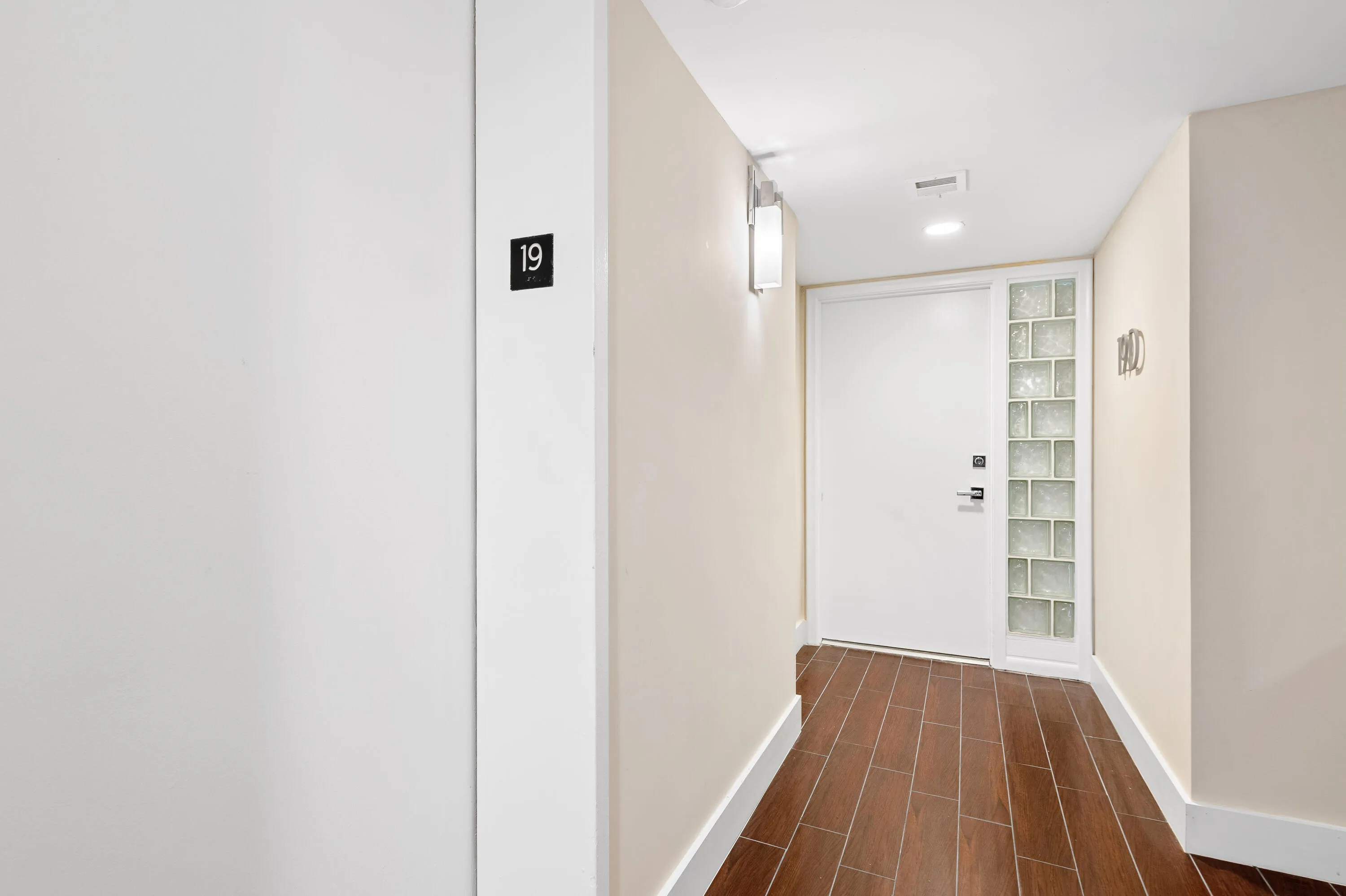 Elevator and entrance