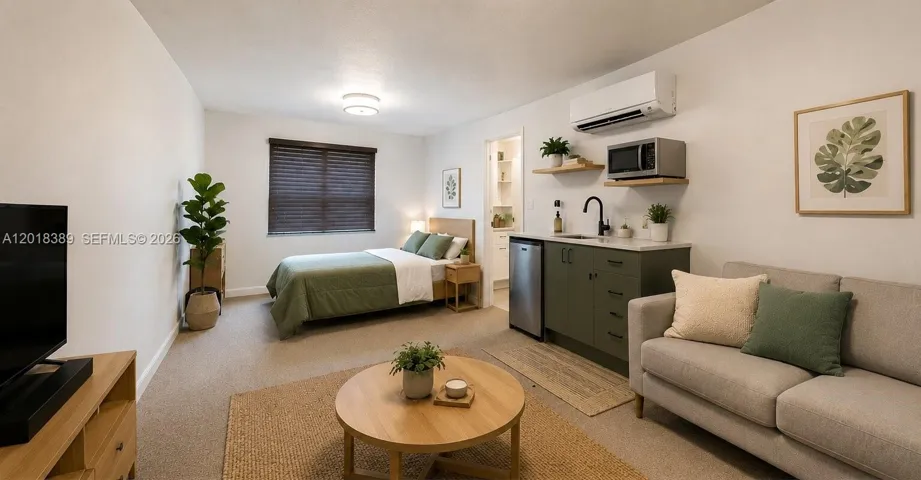 Virtually staged bonus room that could be an efficiency.These items are not in the home. The room is currently set up as an office, music room, and utility room