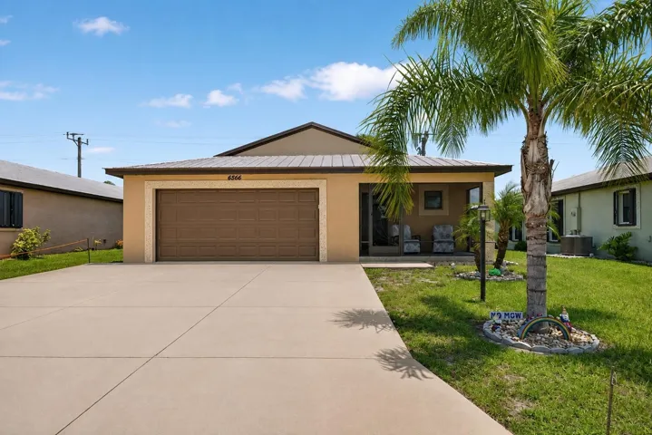 MLS_Exterior_Photo_6566_Garage_Enhanced