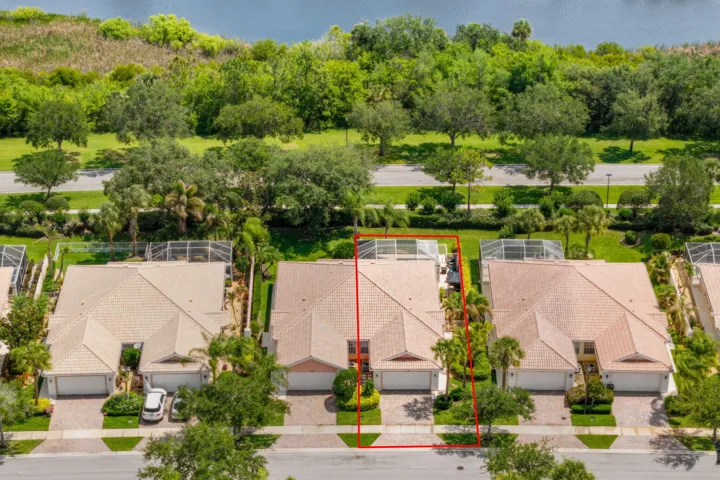 Property backs to lush trees and a pond - no exterior neighbors offering extra privacy!