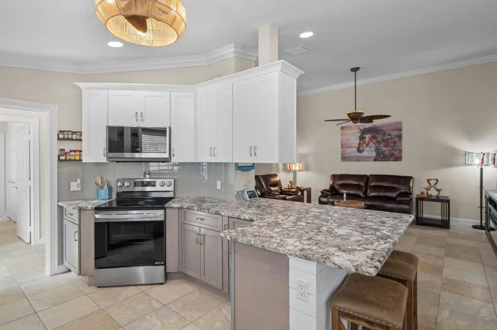 Kitchen - custom cabinetry and new SS appliances