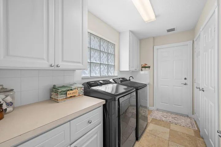 Laundry room - featuring a new washer & dryer