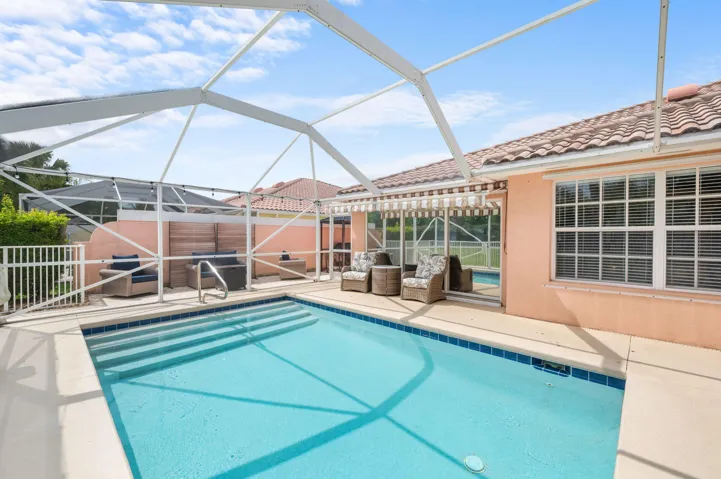 Heated Saltwater pool overlooking the newly paved patio for effortless additional outdoor living