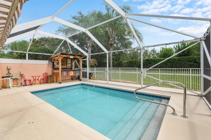 Heated Saltwater Pool featuring new pool equipment