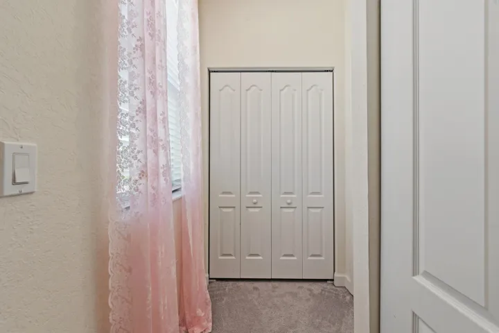 Bright and versatile, this bedroom offers plenty of space for studying, relaxing, or creating the perfect guest suite while providing excellent storage.