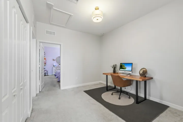 A versatile upstairs loft provides endless possibilities as a home office, media room, playroom, fitness area, or additional living space to fit your lifestyle.