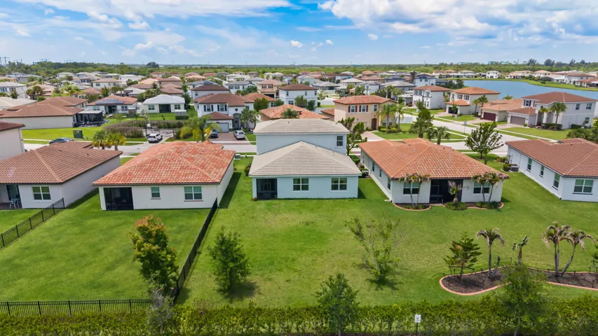 Oversized backyard offers privacy and endless possibilities for outdoor enjoyment.
