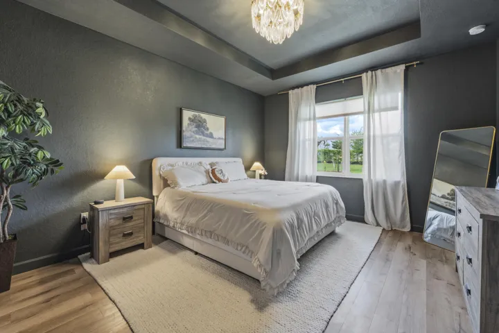 Generously sized primary bedroom designed for comfort, style, and everyday relaxation.