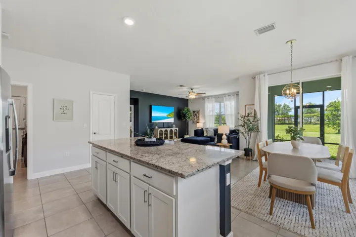 The open layout keeps everyone connected whether you're cooking, dining, or relaxing.