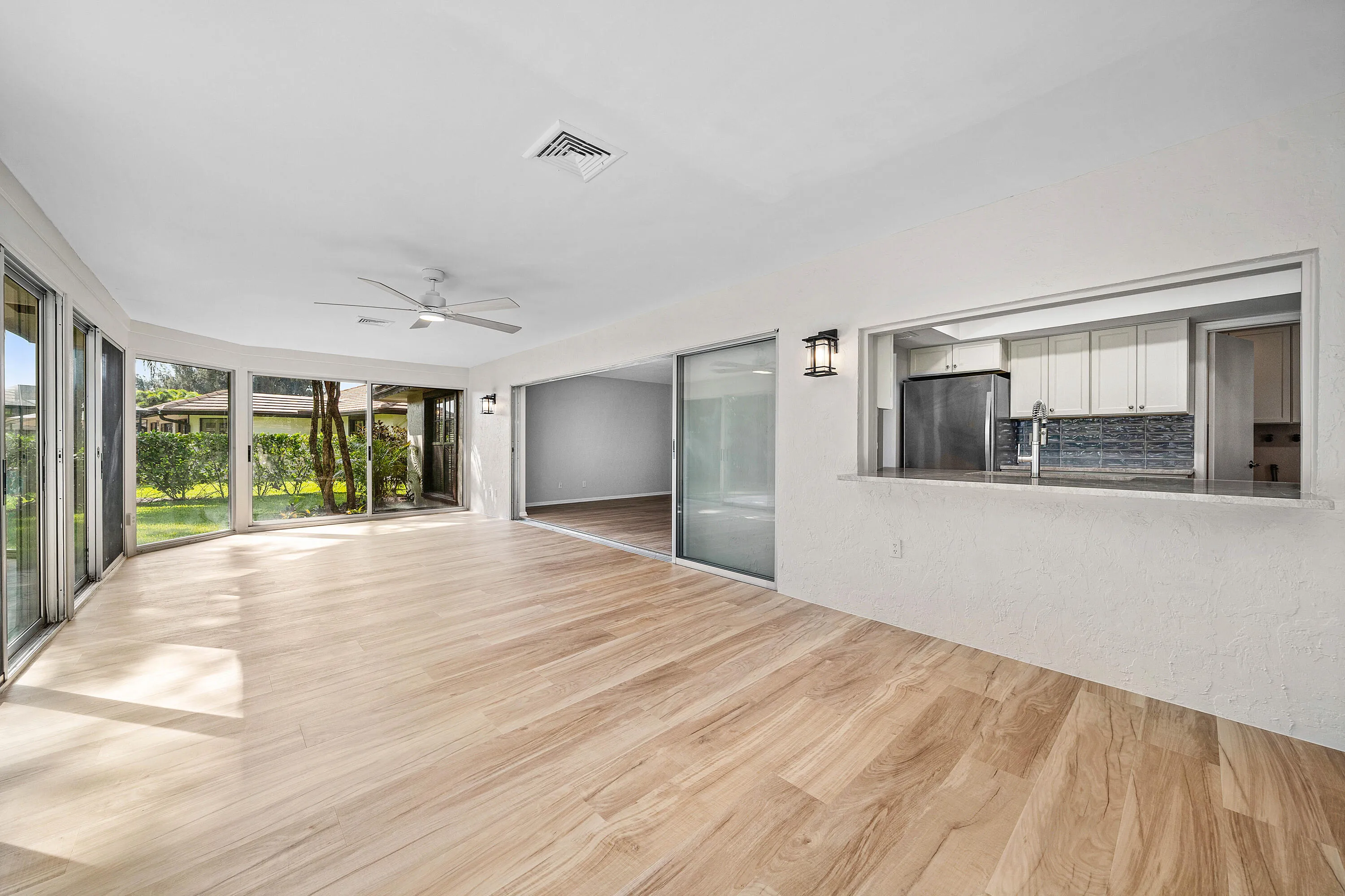 018-433PineVillaDrive-Atlantis-FL-33462-