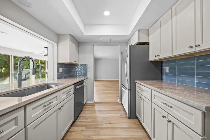 023-433PineVillaDrive-Atlantis-FL-33462-
