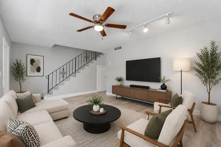 virtual staged Living room staircase view