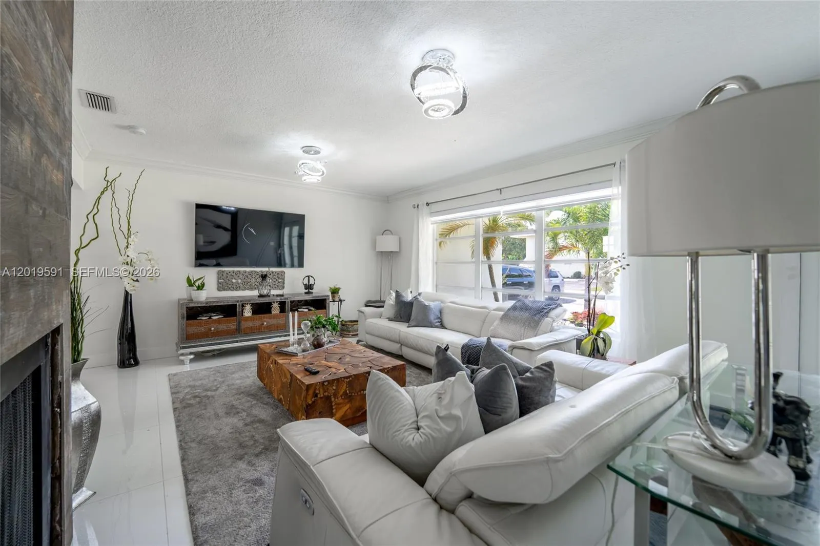 Contemporary indoor living area designed for comfort, entertaining, and seamless indoor-outdoor living.