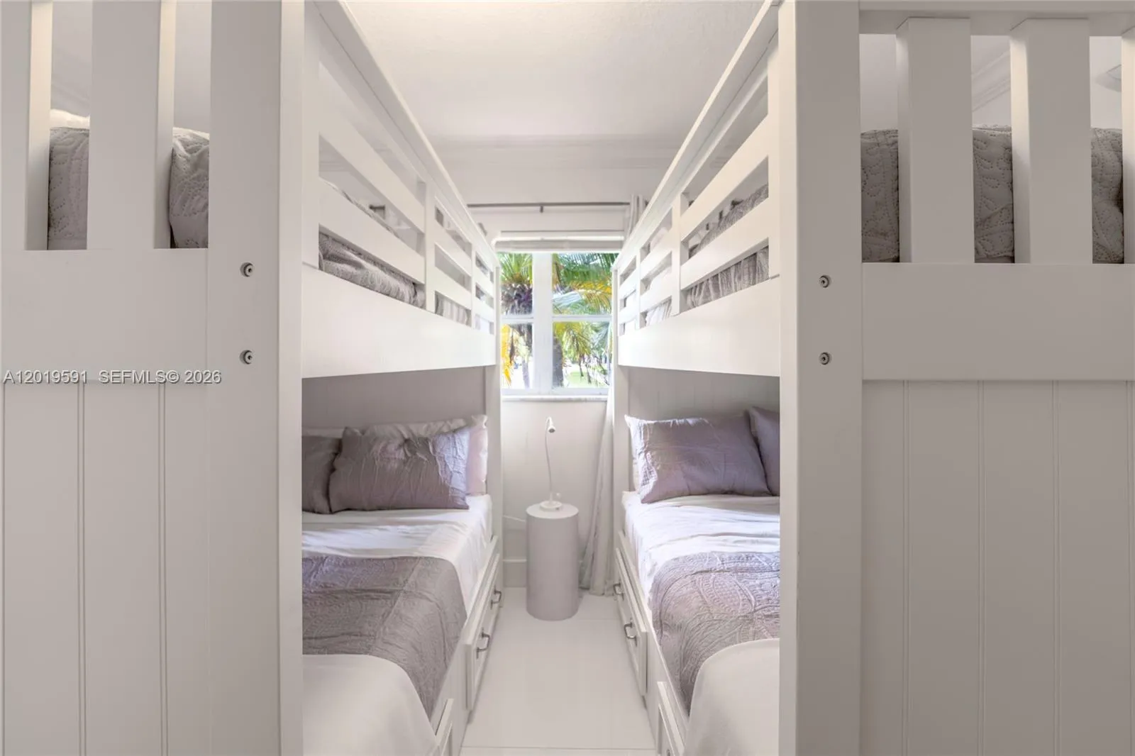 Family-friendly bunk bedroom designed for kids, groups, and comfortable luxury vacation stays.