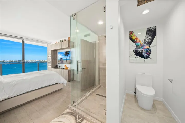 Primary Bedroom & Bathroom