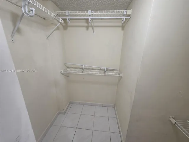 Primary Bedroom Walk in closet