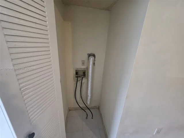 Laundry Closet in Kitchen/ Connections for washer & dryer