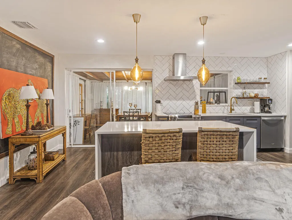 Modern pendant lighting over the kitchen island.