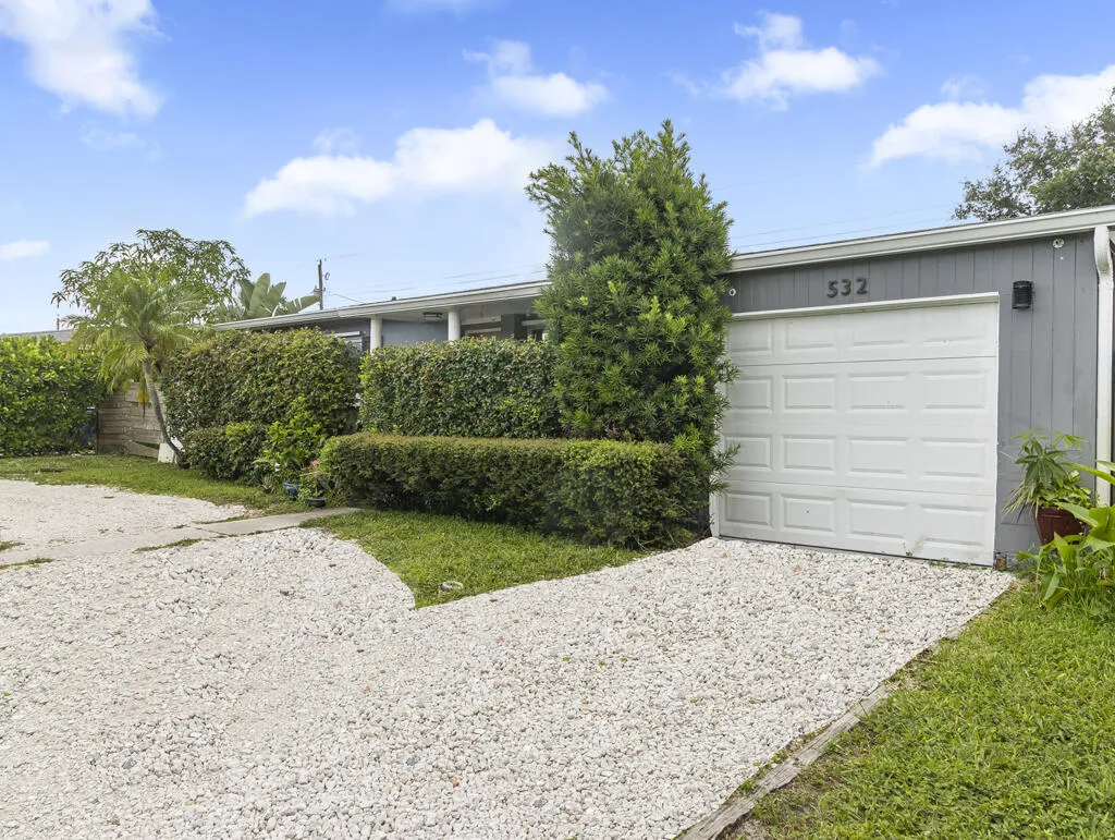 Attached garage/laundry room.