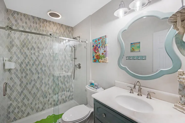 Standup shower with glass enclosure
