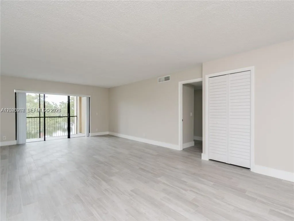 LARGE COMBINED LIVING AND DINING