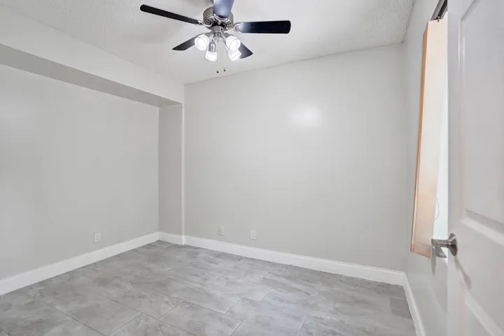 this is a bedroom used as a den office on the first floor