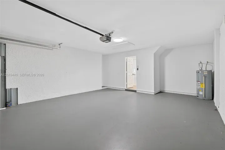 Clean Garage w/Motorized Garage Door Opener
