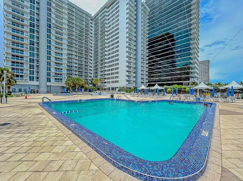 FULL SUNNY RESORT STYLE HEATED POOL