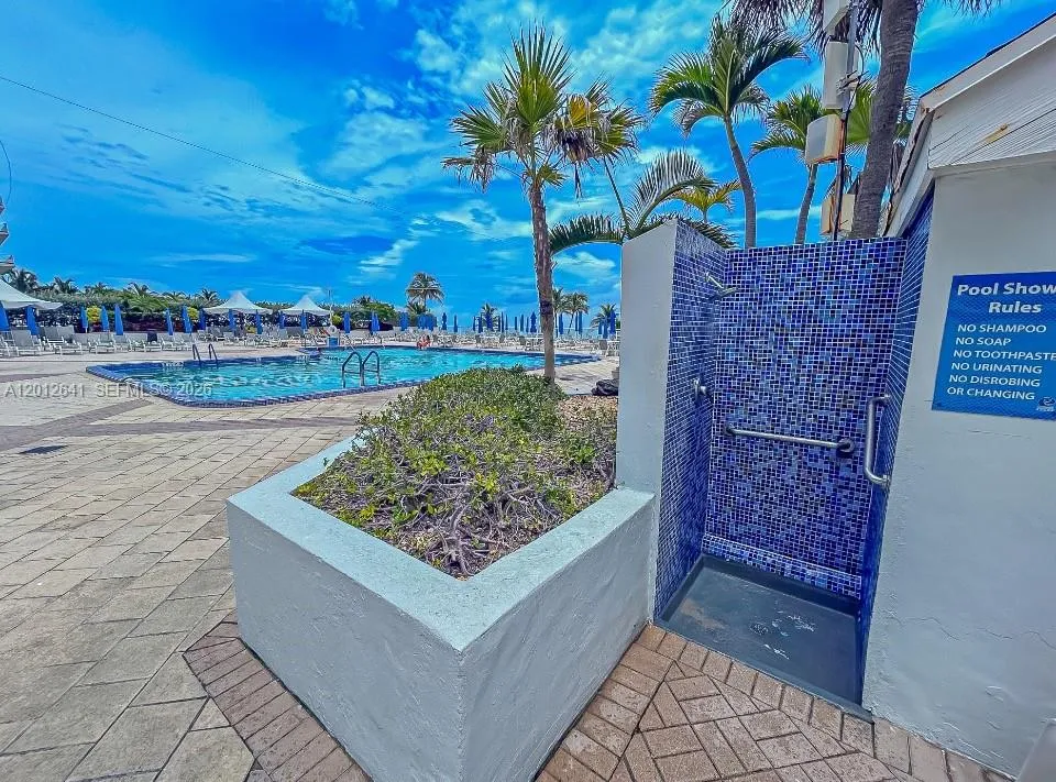 THREE OUTDOOR SHOWERS