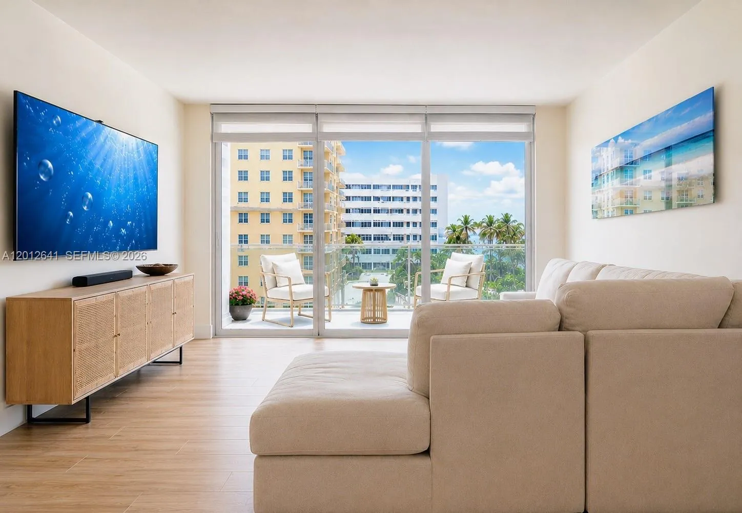SPACIOUS LIVING AREAS WITH PRIME SUNNY SOUTHERN EXPOSURE AND ELEVATED OCEANSIDE GLASS TERRACE VIEWS