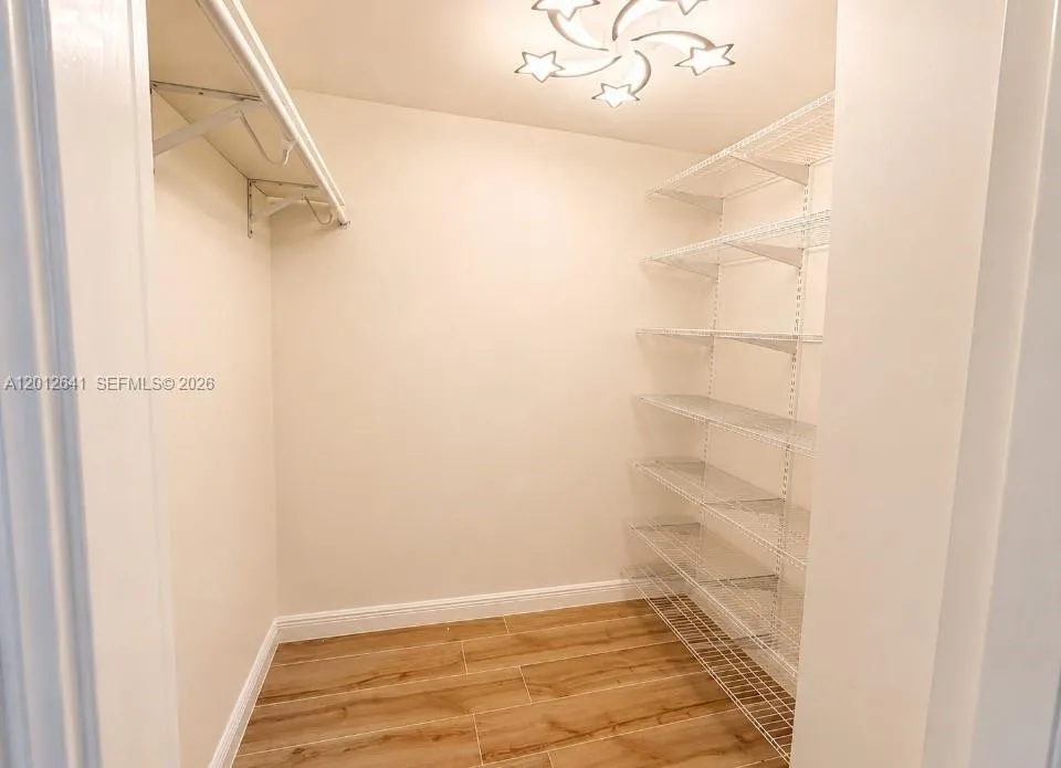 TWO WALK-IN CLOSETS
