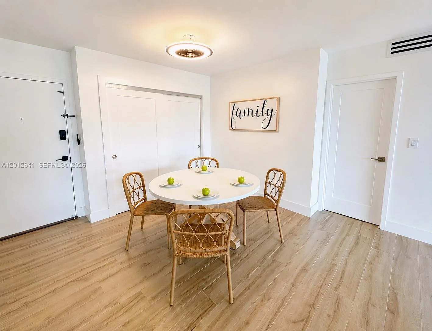 SPACIOUS LIVING / DINING ROOM COMBINATION OFFERS CONTEMPORARY OPEN-FLOOR PLAN WITH EASY ACCESS OCEANSIDE TERRACE PERFECT FOR WARM BREEZES AND CONVERSATION.