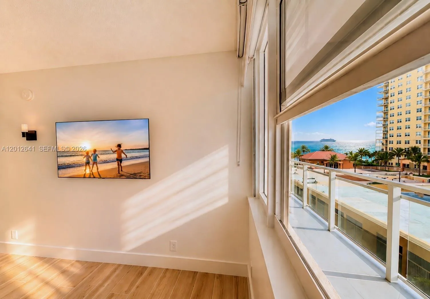 SECOND BEDROOM OCEANSIDE GLASS TERRACE EASTERN OCEAN VIEWS (HURRICANE IMPACT WINDOWS).